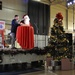Santa and Army. Col. Kurt Connell light the tree
