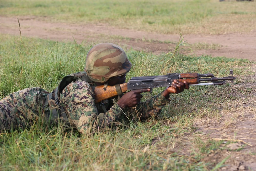 SPMAGTF-CR-AF Marines train UPDF soldiers on firing techniques