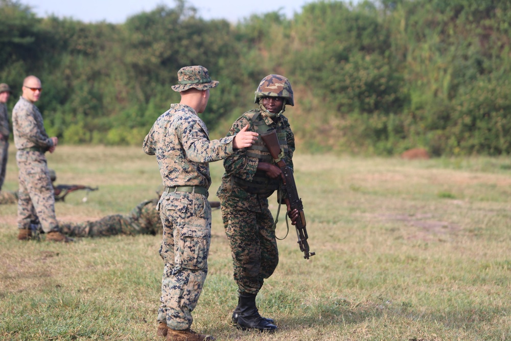 SPMAGTF-CR-AF Marines train UPDF soldiers on firing techniques