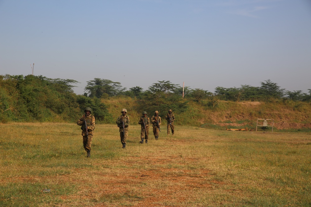 SPMAGTF-CR-AF Marines train UPDF soldiers on firing techniques