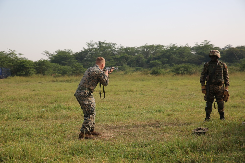 SPMAGTF-CR-AF Marines train UPDF soldiers on firing techniques