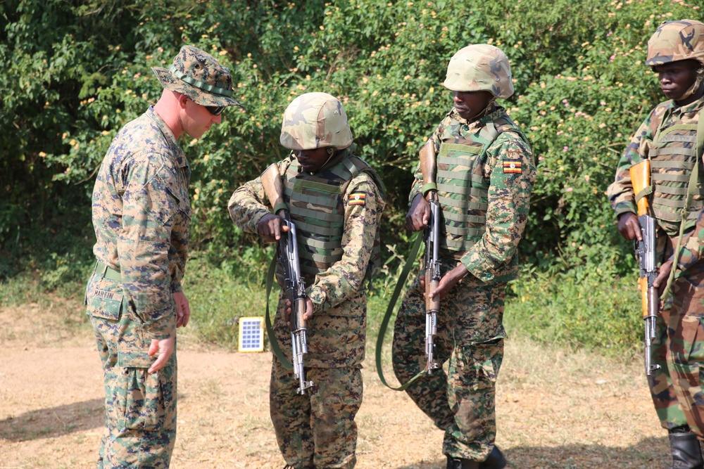 SPMAGTF-CR-AF Marines train UPDF soldiers on firing techniques