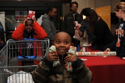 AFOSI mentors youth through “Shop with a Cop”
