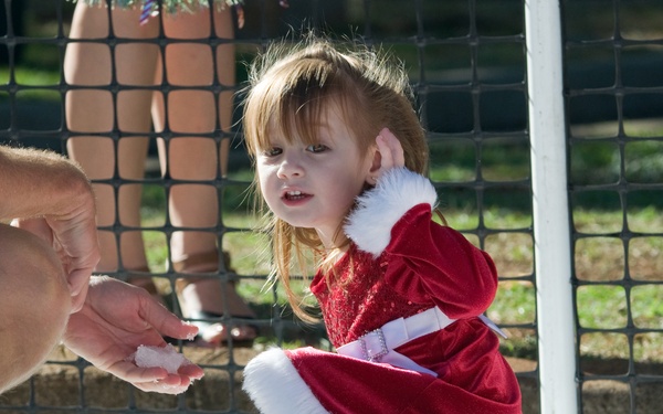 Families walk through AMR Winter Wonderland