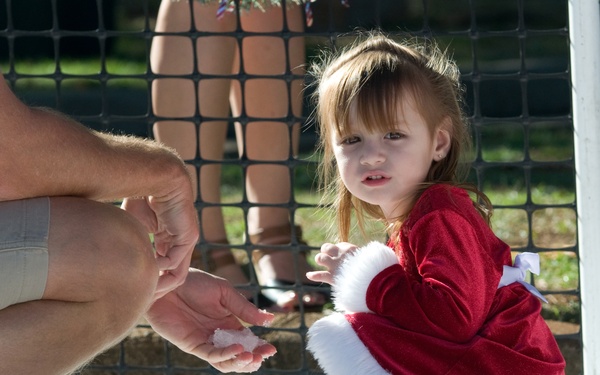 Families walk through AMR Winter Wonderland