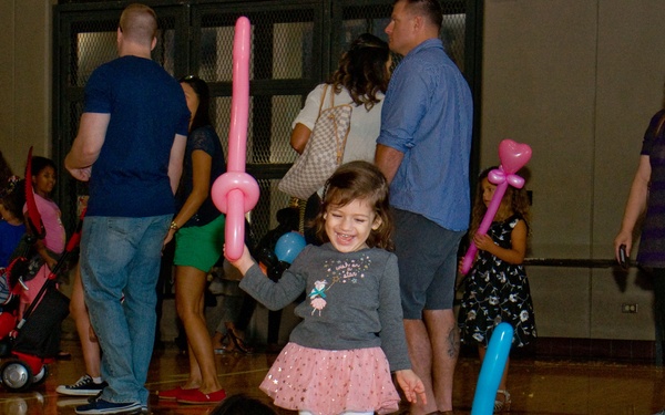 Families walk through AMR Winter Wonderland