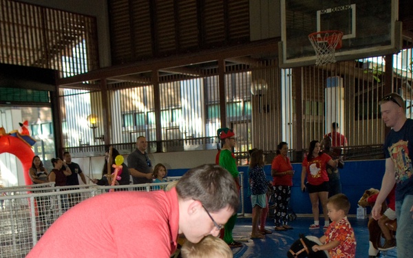 Families walk through AMR Winter Wonderland