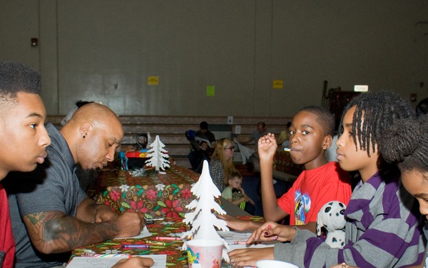 Families walk through AMR Winter Wonderland