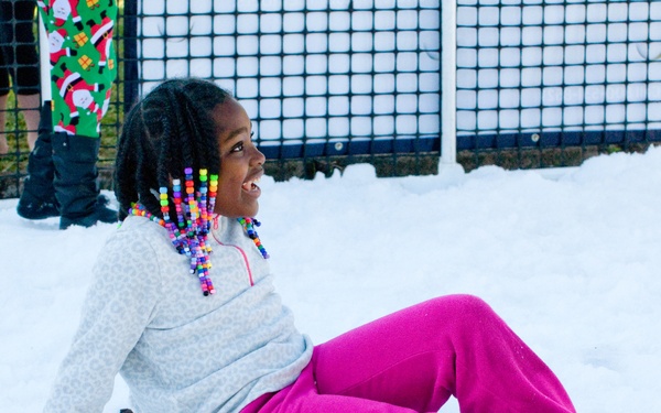 Families walk through AMR Winter Wonderland