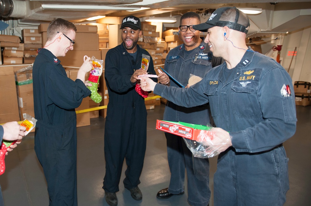 USS America Sailors share gifts