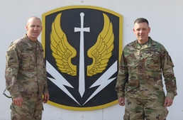 Maj. Gen. Robert White welcomes the 449th CAB Commander Lt. Col. Joseph Bishop