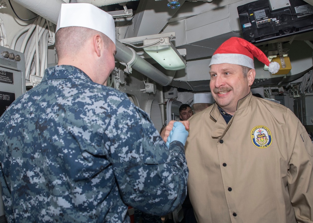 Bonhomme Richard hosts Christmas Dinner in the ship's mess.