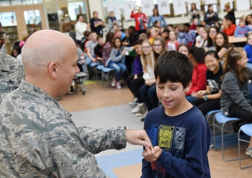 Senior leaders present awards to HMS students