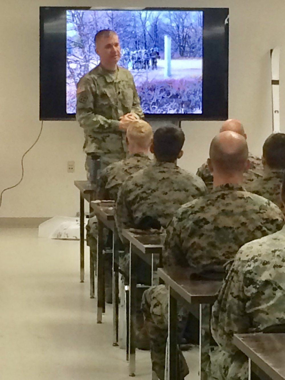 Fort McCoy's deputy garrison commander congratulates CWOC graduates