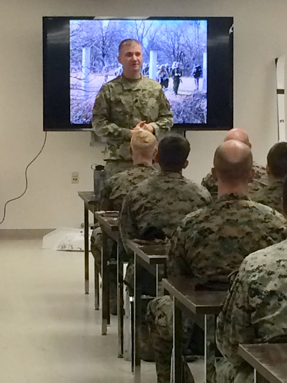 Fort McCoy's deputy garrison commander congratulates CWOC graduates