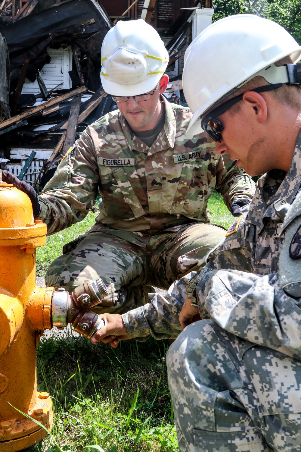 Soldiers from 16th Engineer Brigade help remove urban blight in Youngstown during annual training