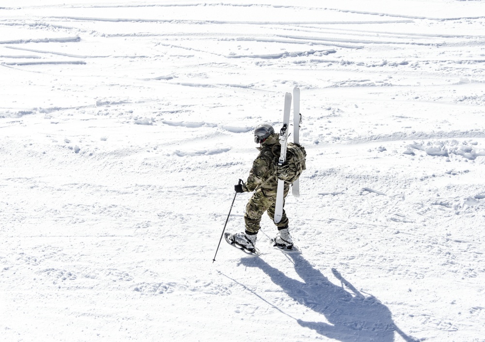 Paratrooper snowshoes through Dolomites