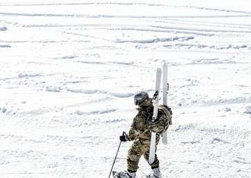 Paratrooper snowshoes through Dolomites