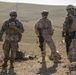 U.S. Marines call in artillery support with foreign military