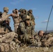 U.S. Marines call in artillery support with foreign military