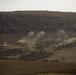 U.S. Marines call in artillery support with foreign military