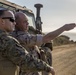 U.S. Marines call in artillery support with foreign military