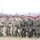Combined paratroopers march together Combined paratroopers march together