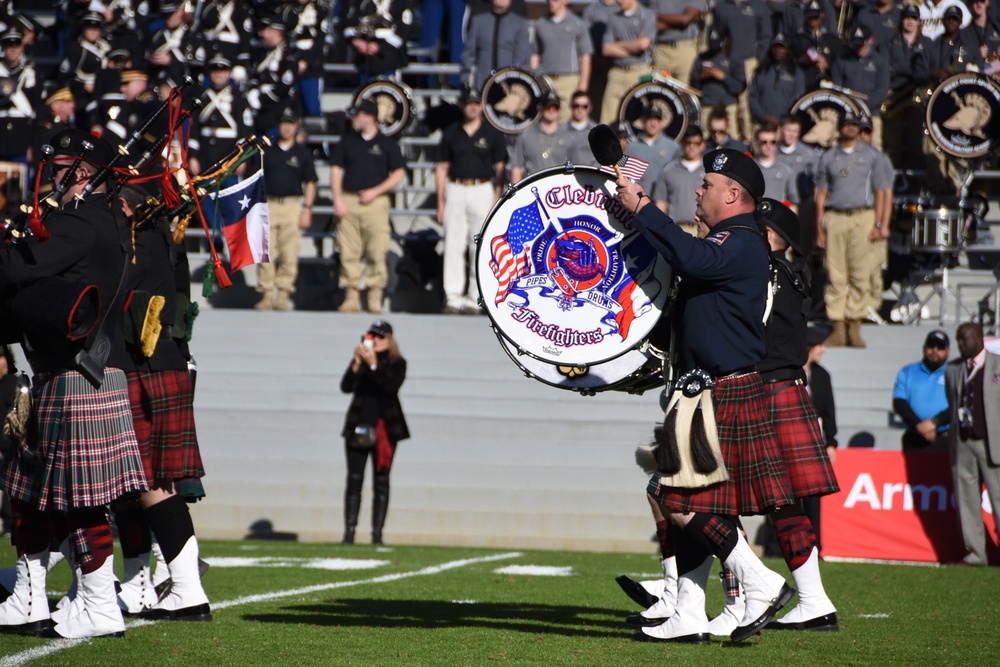 Bag pipes perform at Armed Forces Bowl