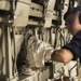 USS San Diego (LPD 22) Fireman Cleans An Engine