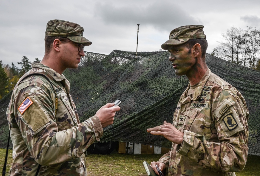 Interviewing the commander