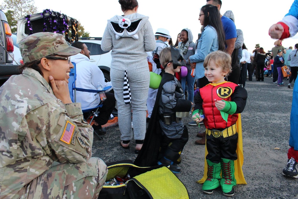 Trunk or Treat: 704th MI family event features decorated car trunks, haunted house, games, candy, gifts