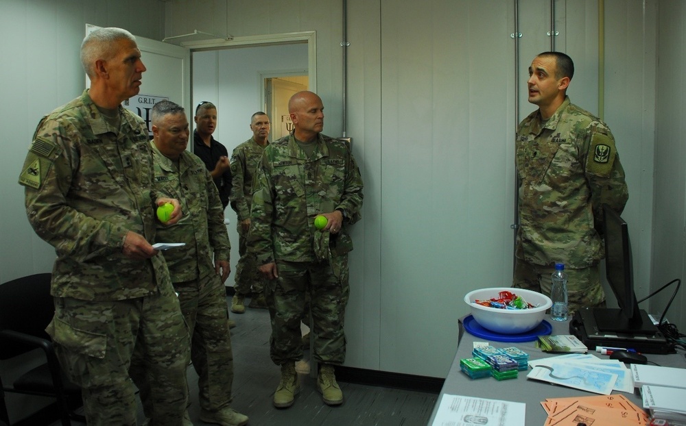 Soldier briefs the 35th Infantry Division Commander