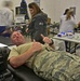 Airmen donate blood for Battle of the Badges campaign