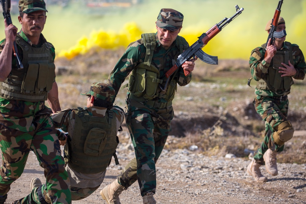 Security forces graduate course and demonstrate skills in Erbil