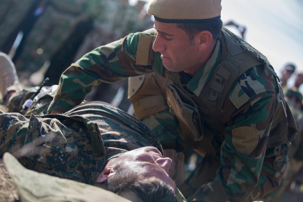 Security forces graduate course and demonstrate skills in Erbil