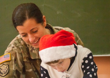 New York Army National Guards Soldiers deployed to Ukraine visits local orphanage.