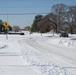 Ice, snow blankets base community
