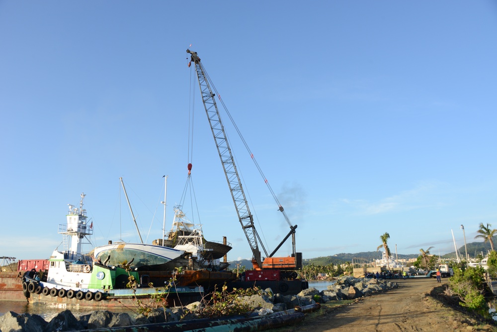 Photo Release: Hurricane Maria response crews transfer wrecked vessels for disposal in Fajardo, Puerto Rico