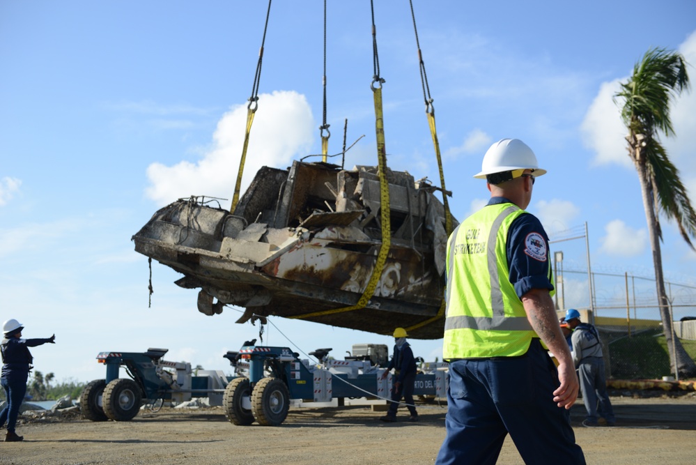 Photo Release: Hurricane Maria response crews transfer wrecked vessels for disposal in Fajardo, Puerto Rico