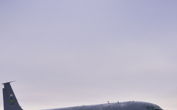 KC-135 Stratotankers sit on a snowy flightline
