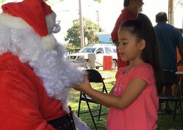 Airman helps spread Christmas joy in Guam’s Merizo village