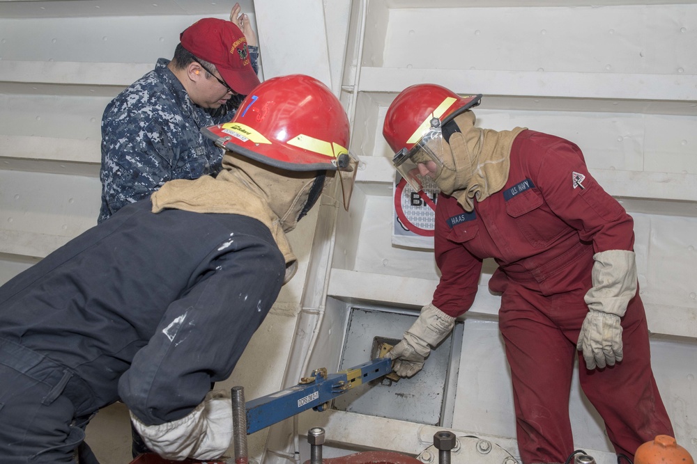 USS Bonhomme Richard's (LHD 6) flying squad conducts a ready-for-sea drill.