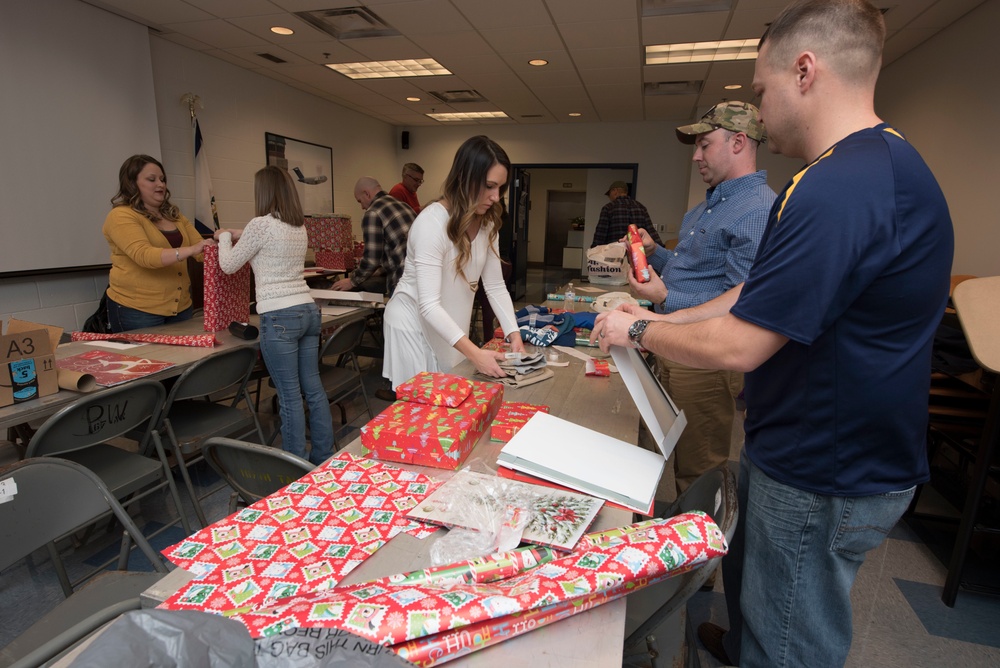 Pilot spreads Christmas cheer through new gift giving program