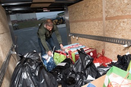 Pilot spreads Christmas cheer through new gift giving program