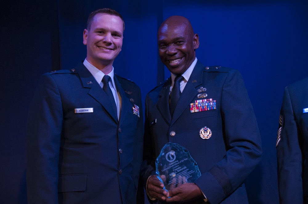 The Nevada Air National Guard's 2017 Company Grade Officer of the Year, Capt. Reed Kobernik of the 192nd Airlift Squadron accepts his award from  Assistant Adjutant General, Brig. Gen. Ondra Berry