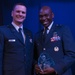 The Nevada Air National Guard's 2017 Company Grade Officer of the Year, Capt. Reed Kobernik of the 192nd Airlift Squadron accepts his award from  Assistant Adjutant General, Brig. Gen. Ondra Berry