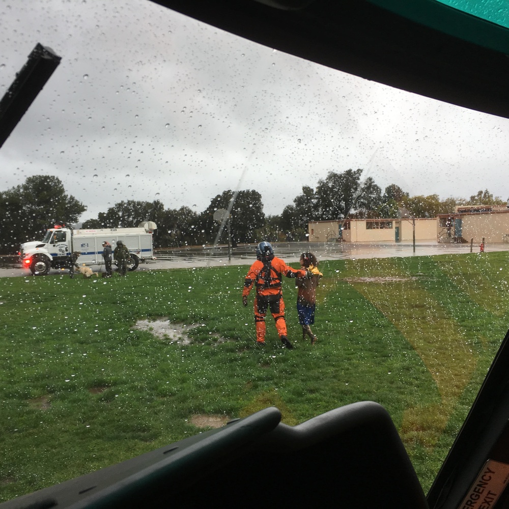 Coast Guard helicopter crews rescue mudslide victims in Santa Barbara County