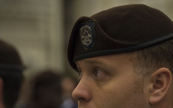 Quiet Professionals don brown beret