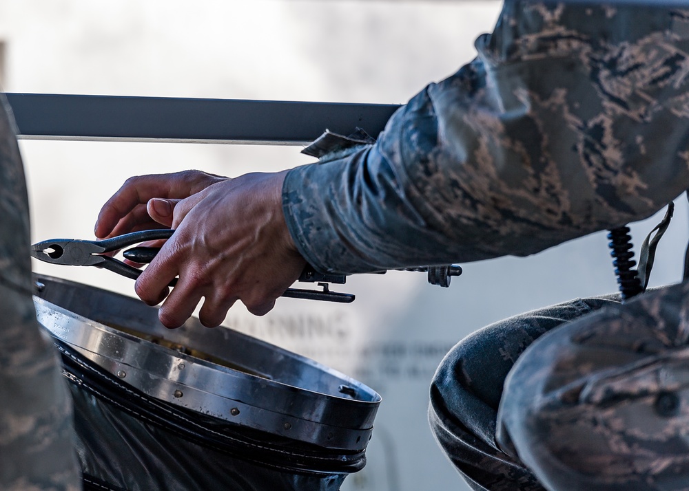 Maintainers work thru record cold weather.