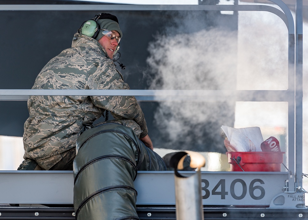 Maintainers work thru record cold weather.